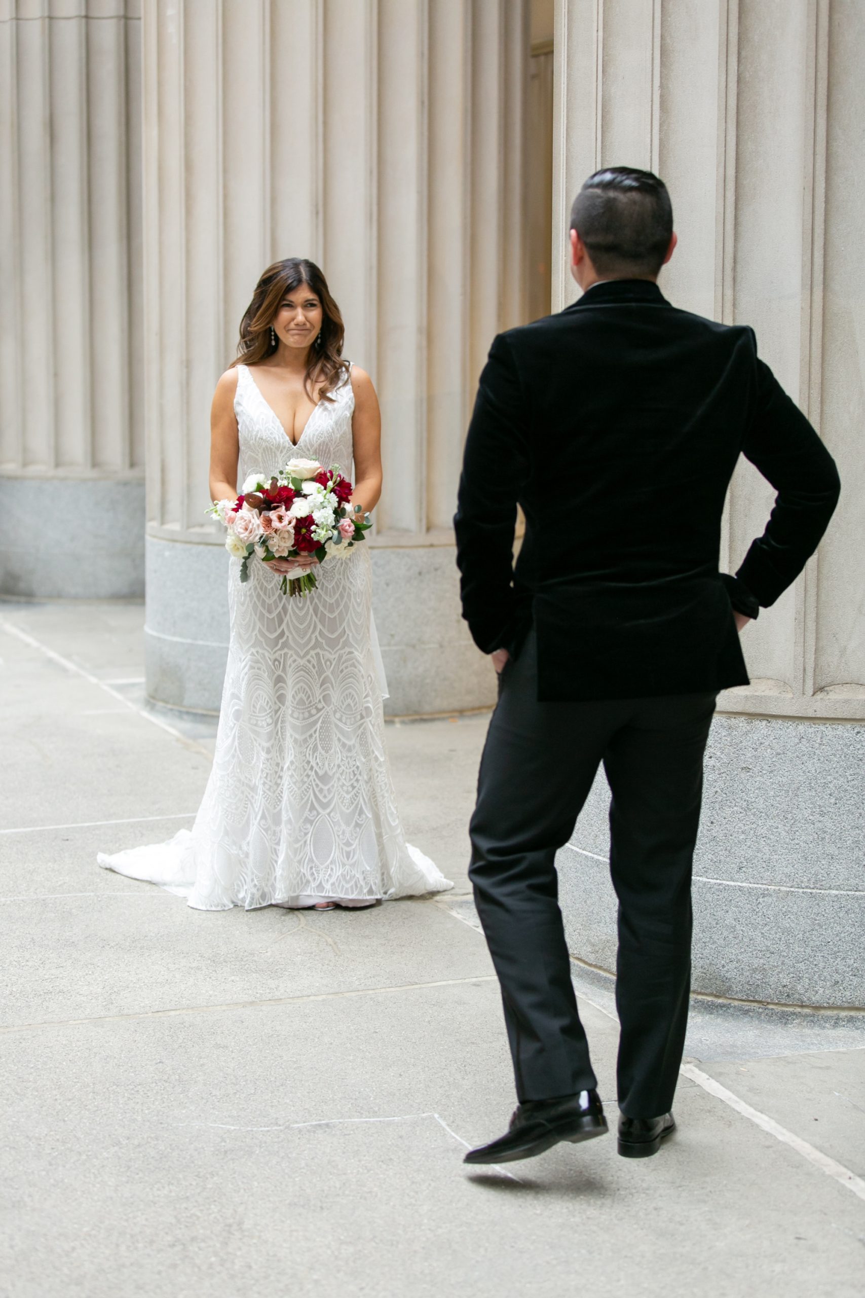 the bride and groom shared a sweet first look in downtown Chicago