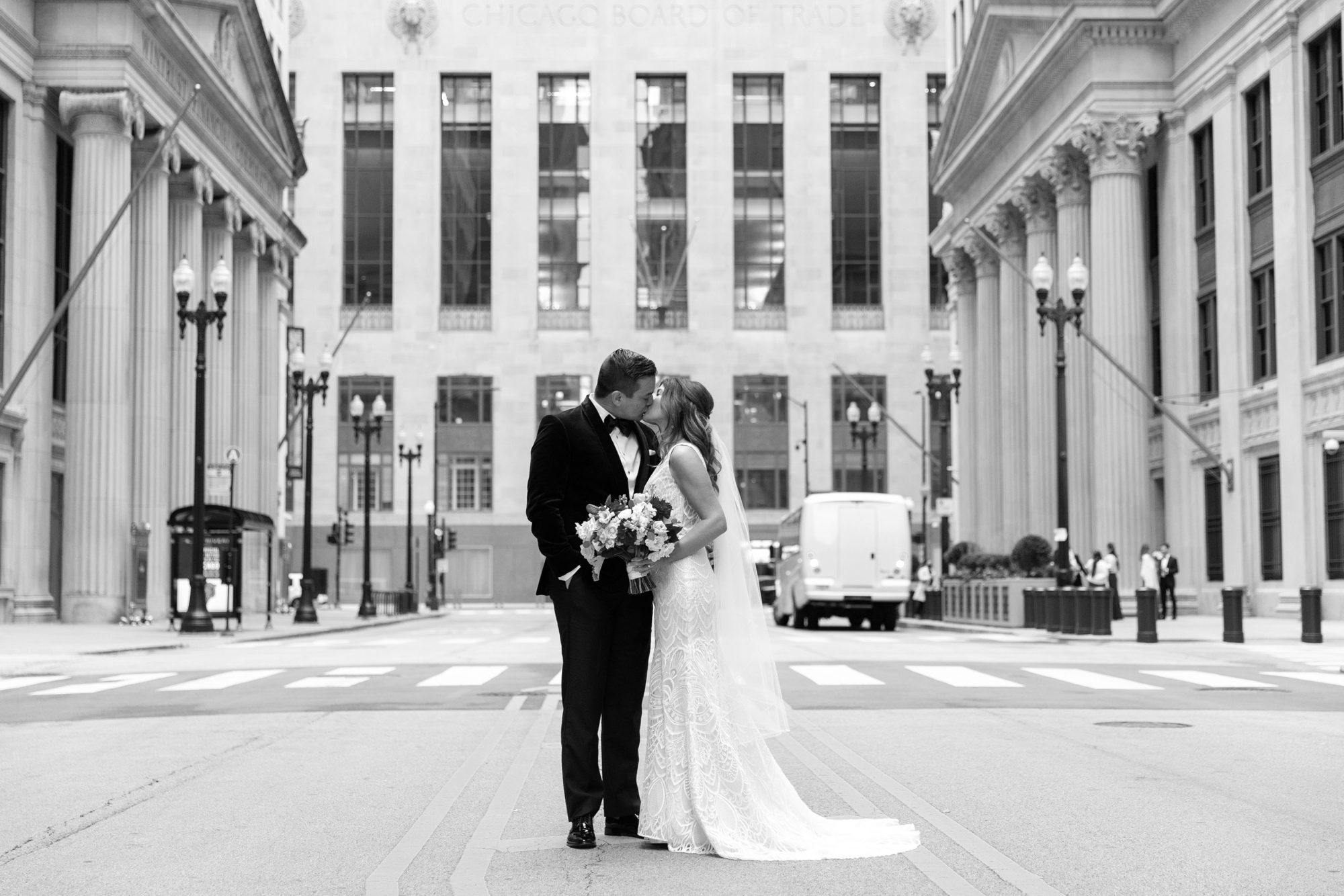 the bride and groom kissed in downtown Chicago