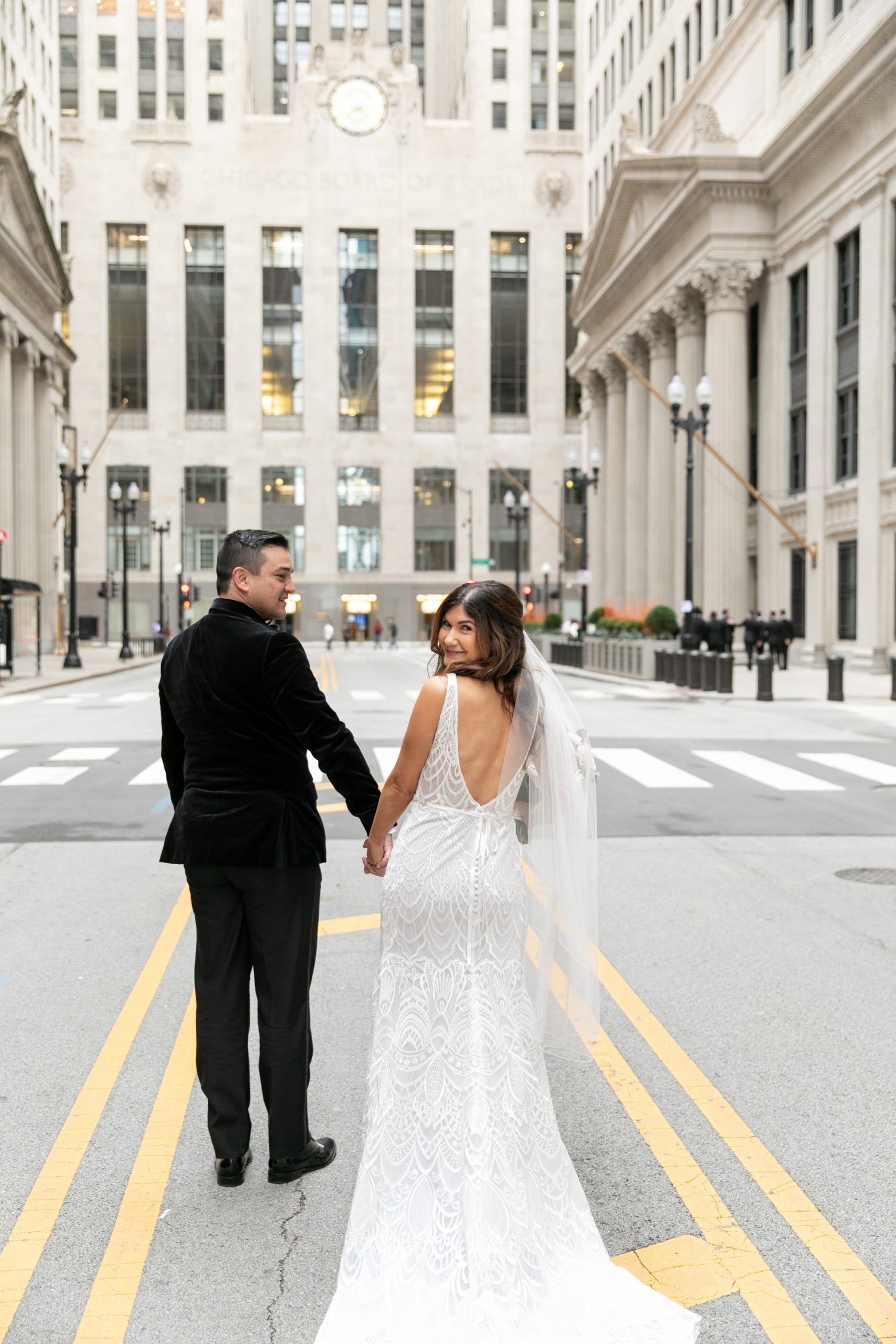 the bride and groom posed for downtown Chicago wedding photos