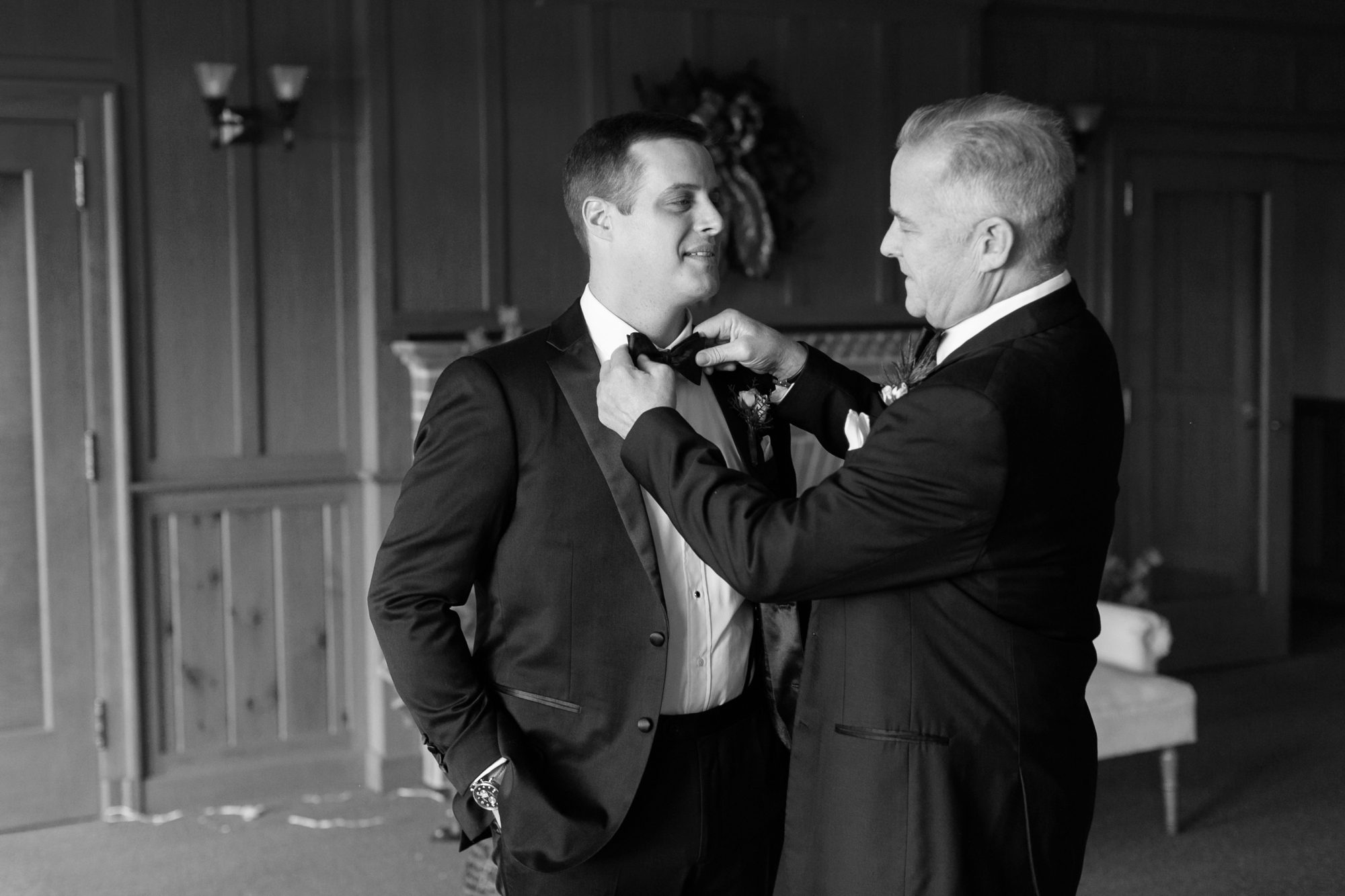 the groom got ready with the help of his dad
