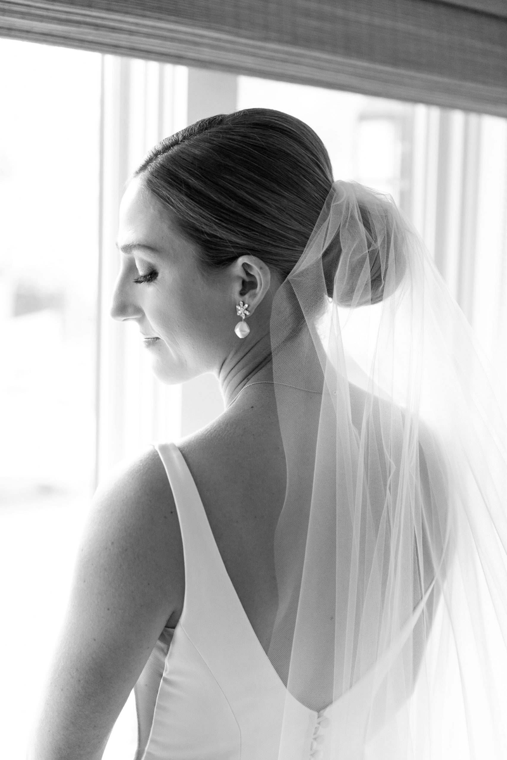 the bride wore her hair in a chic updo