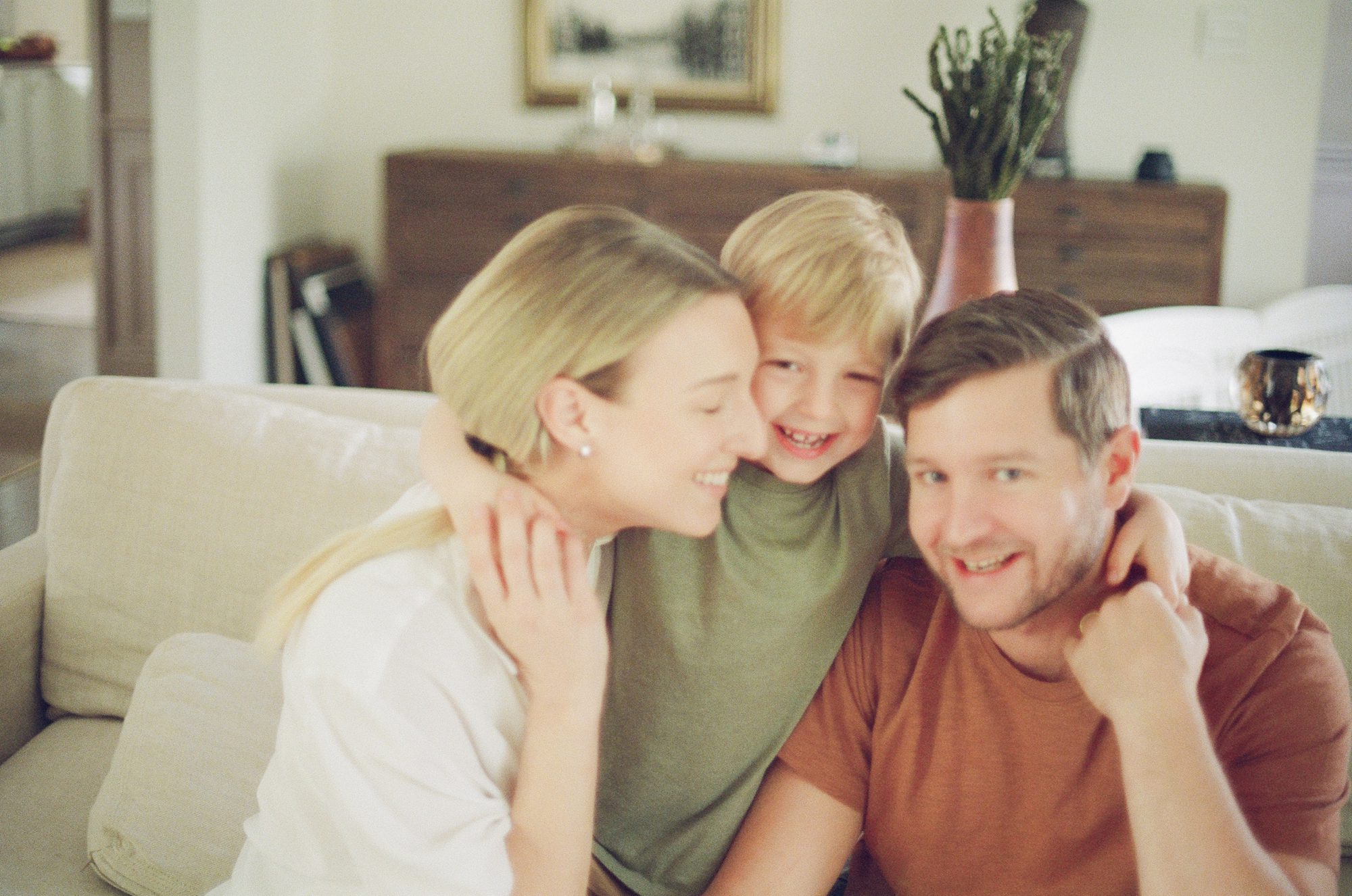 The family hugged during their in-home photo shoot by Chicago photographer Christy Tyler