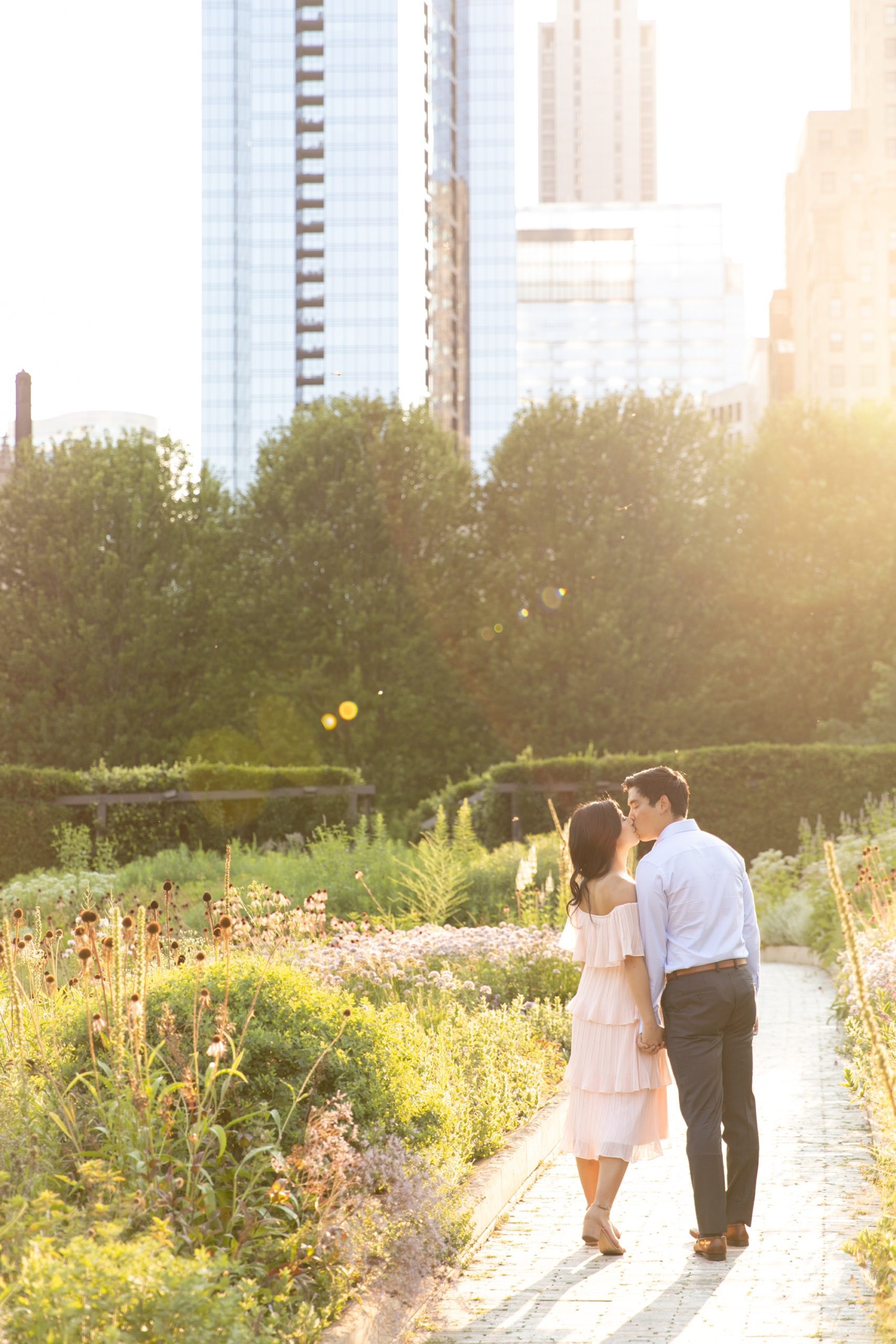 The couple kissed during the summer engagement photos in Chicago