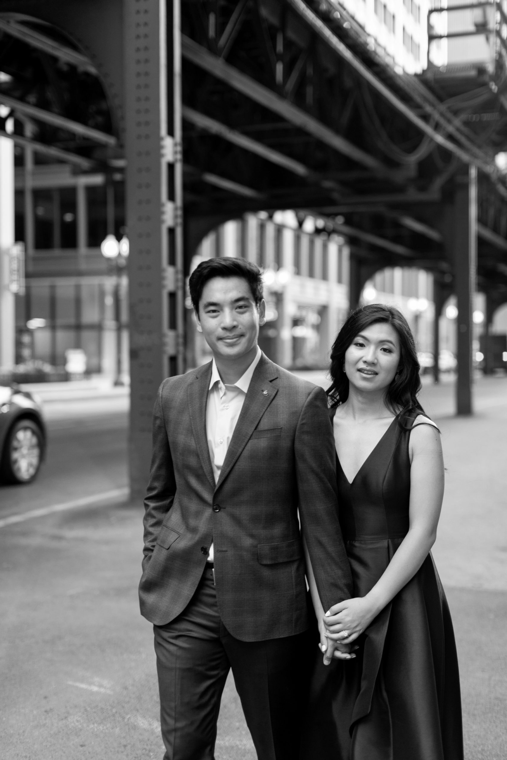 the couple smiled at the camera during their Chicago engagement photo shoot