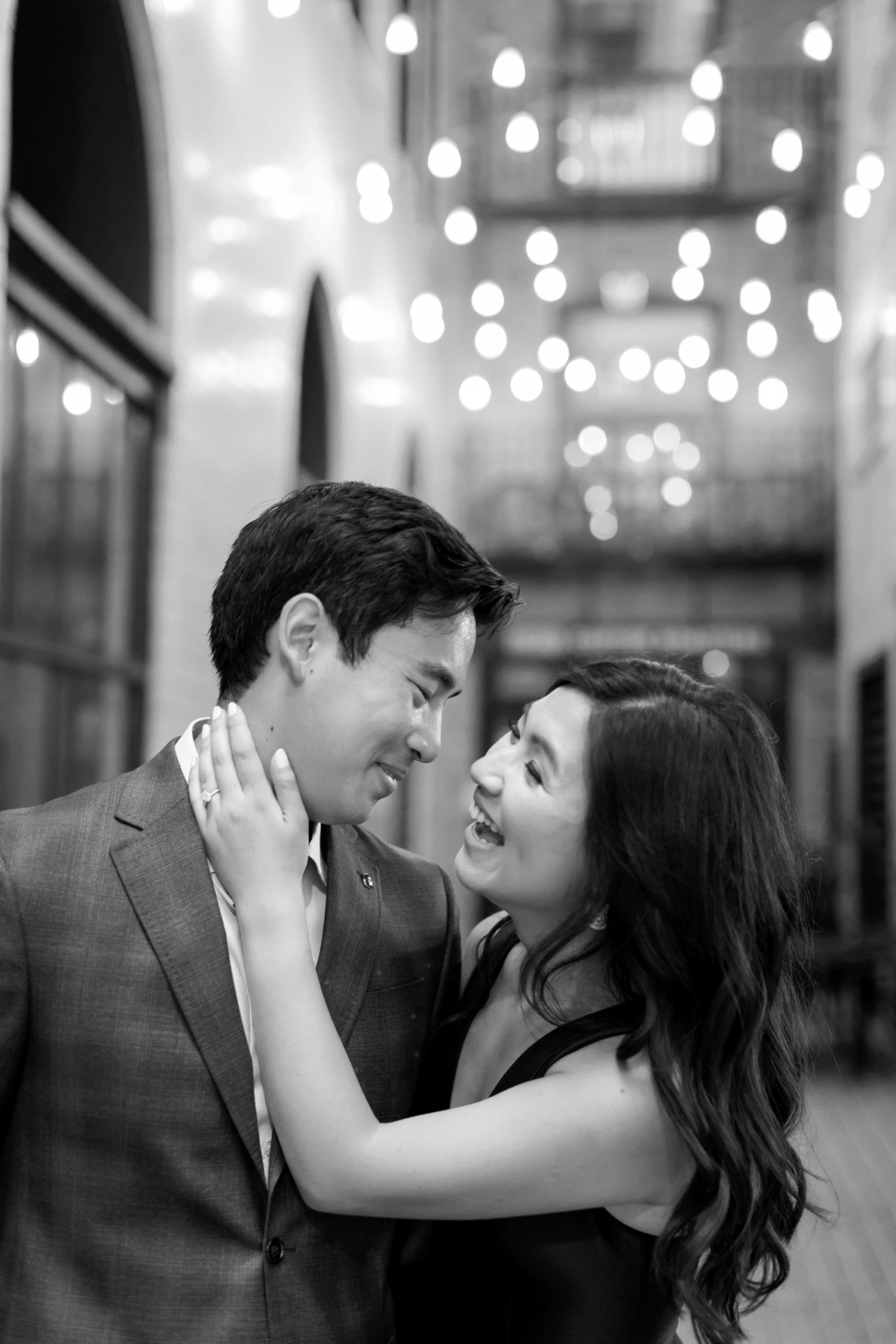 the couple laughed during their summer engagement photo shoot in Chicago
