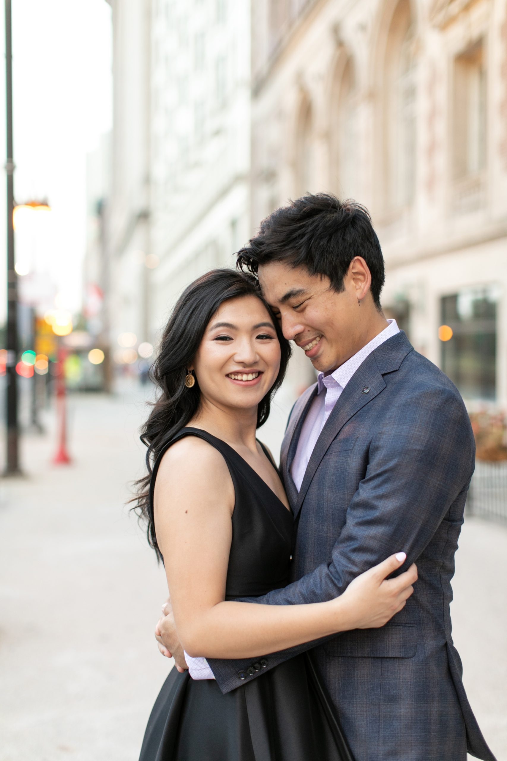 The couple hugged and smiled during their summer engagement photo session in downtown Chicago