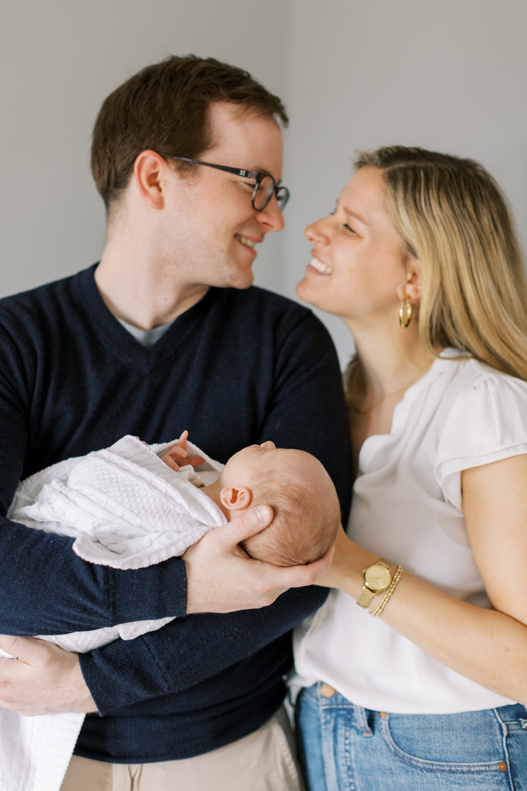 mom and dad with their baby during Chicago newborn photos