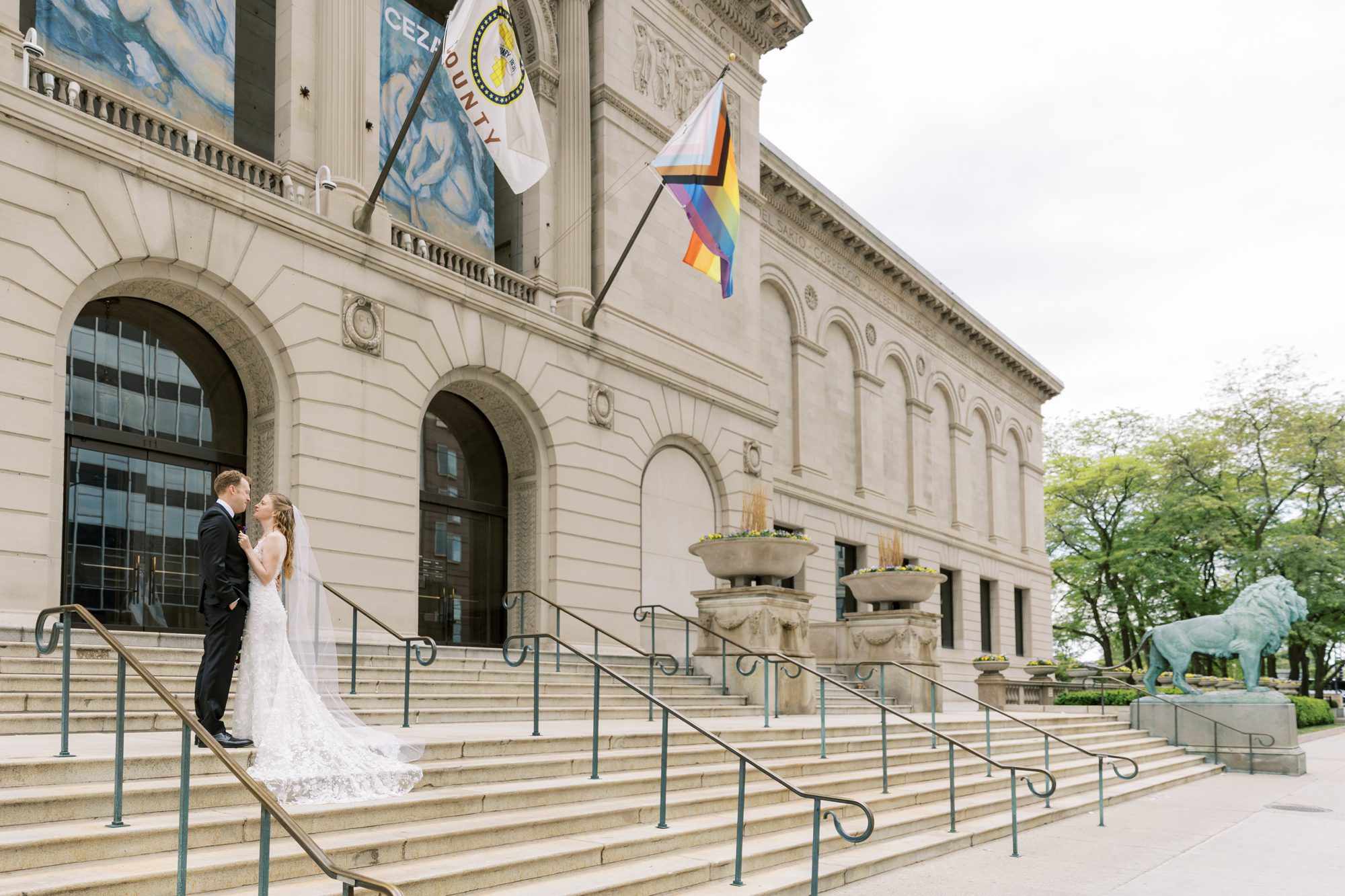 Bride and groom pose for wedding photos at Chicago Art Institute