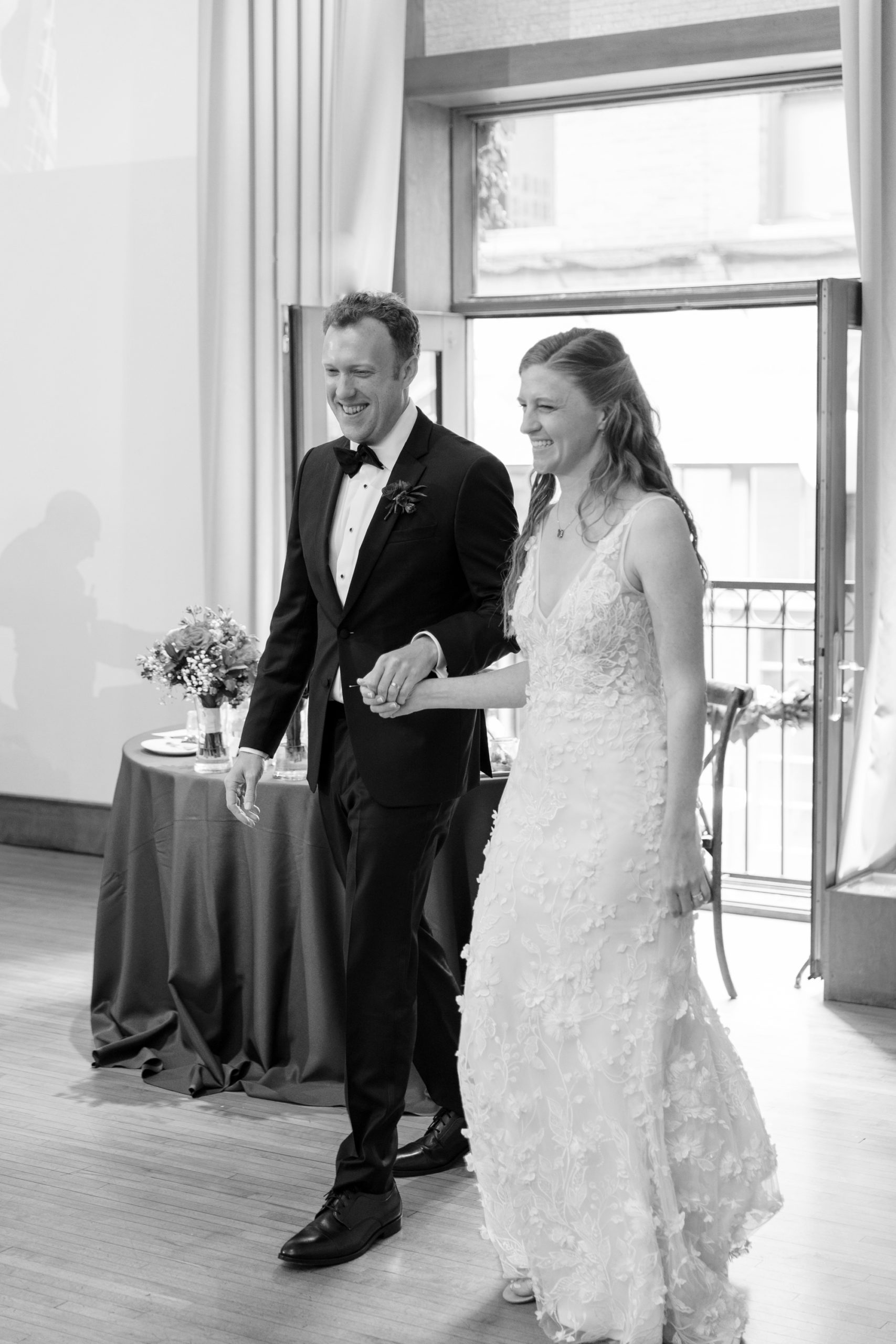 Bride and groom enter Ivy Room for their Chicago brunch wedding