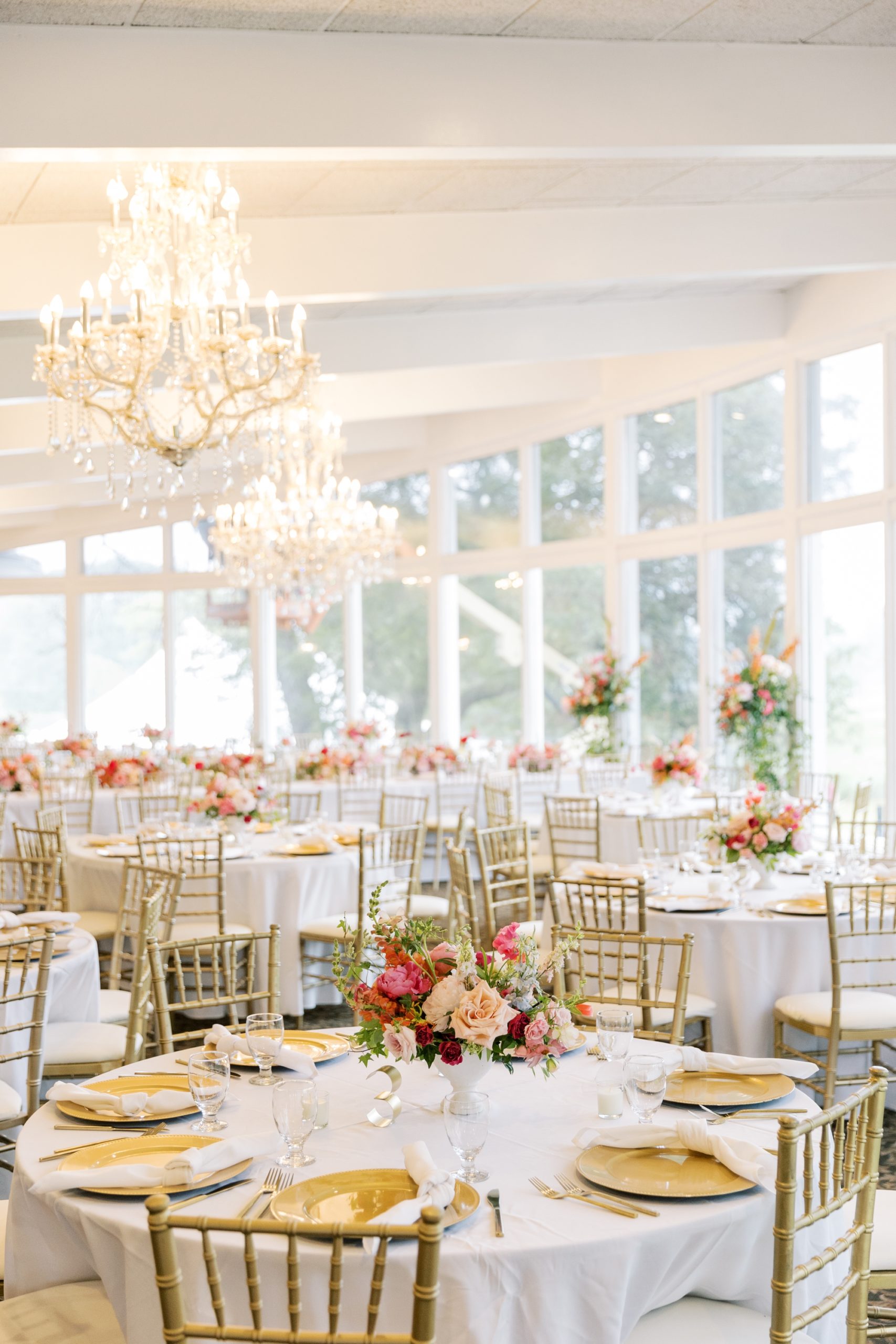 Light and airy reception room at the Lake Windsor Country Club wedding