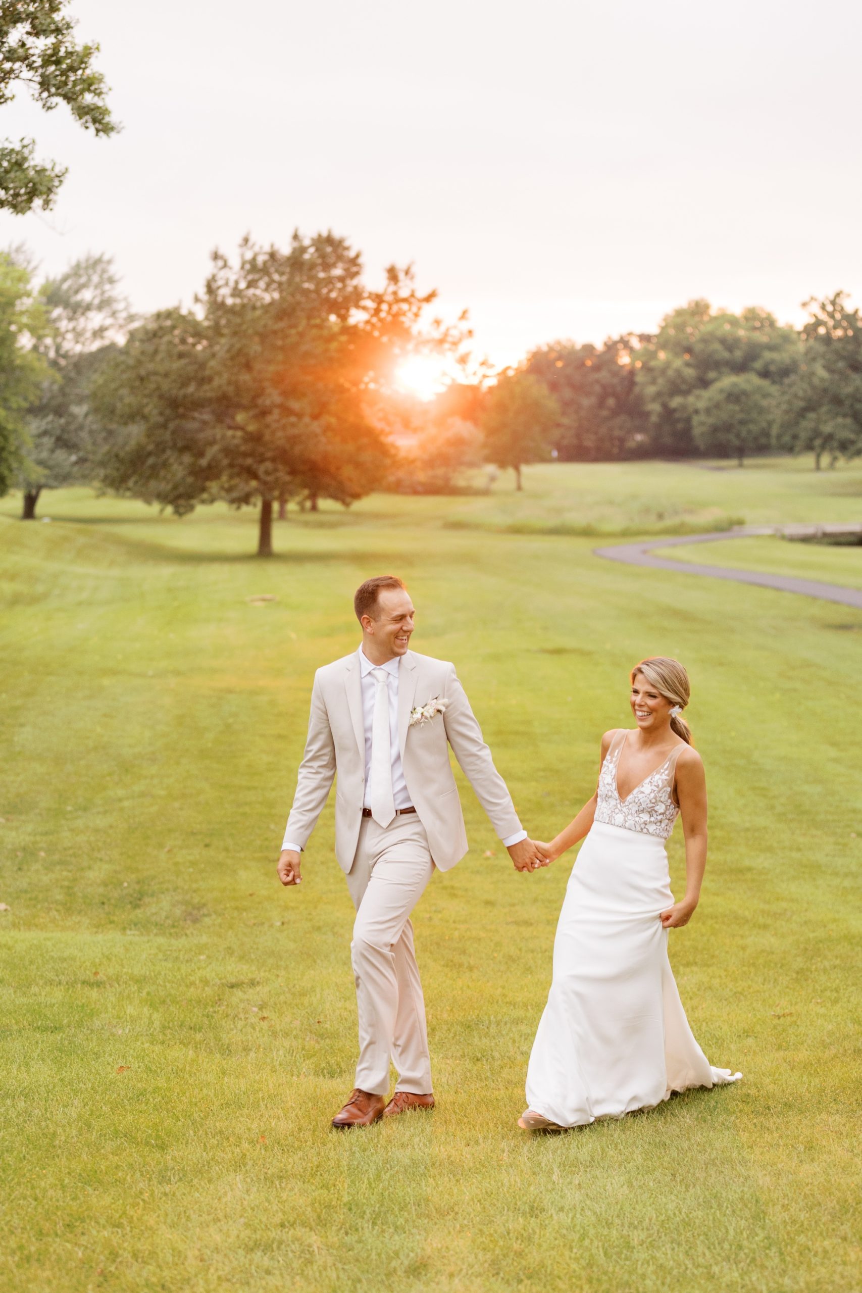 Bride and groom at sunset at their Lake Windsor Country Club wedding