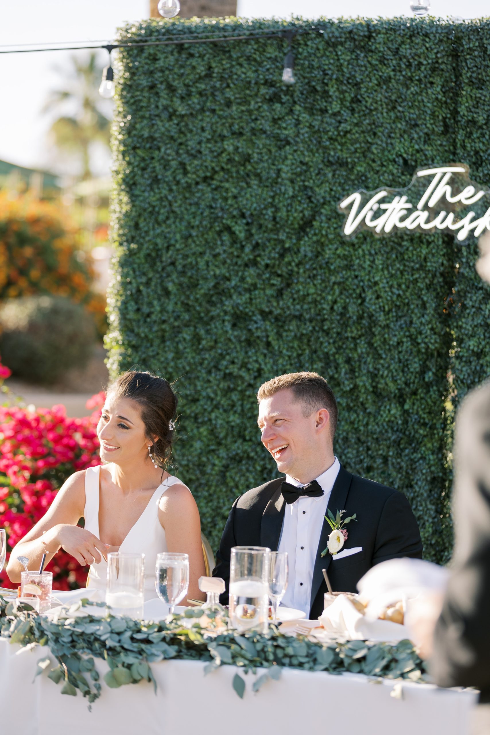 The bride and groom laughed during the toasts at their Camelback Inn in Scottsdale wedding