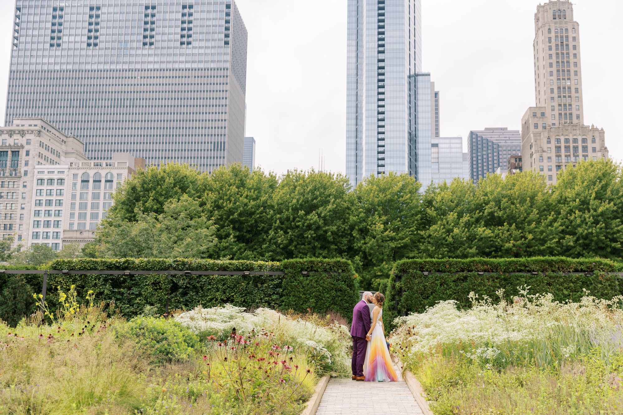 Bride and groom pose for downtown Chicago wedding photos