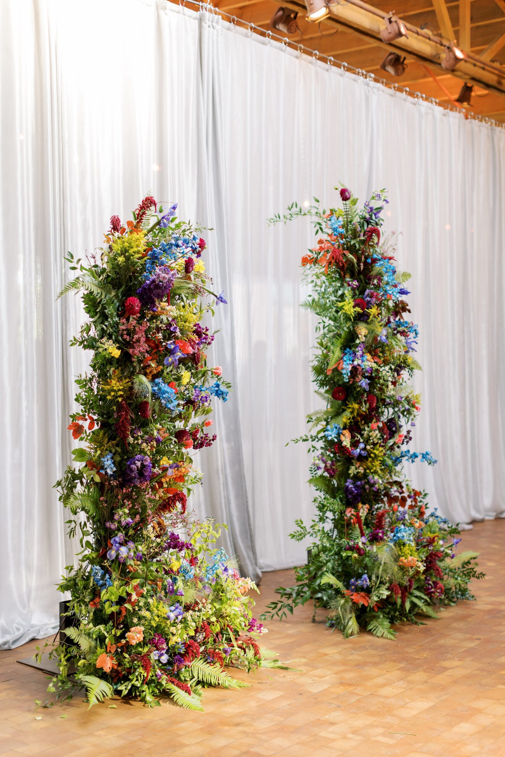 The colorful wedding ceremony arch fit the colorful wedding palette