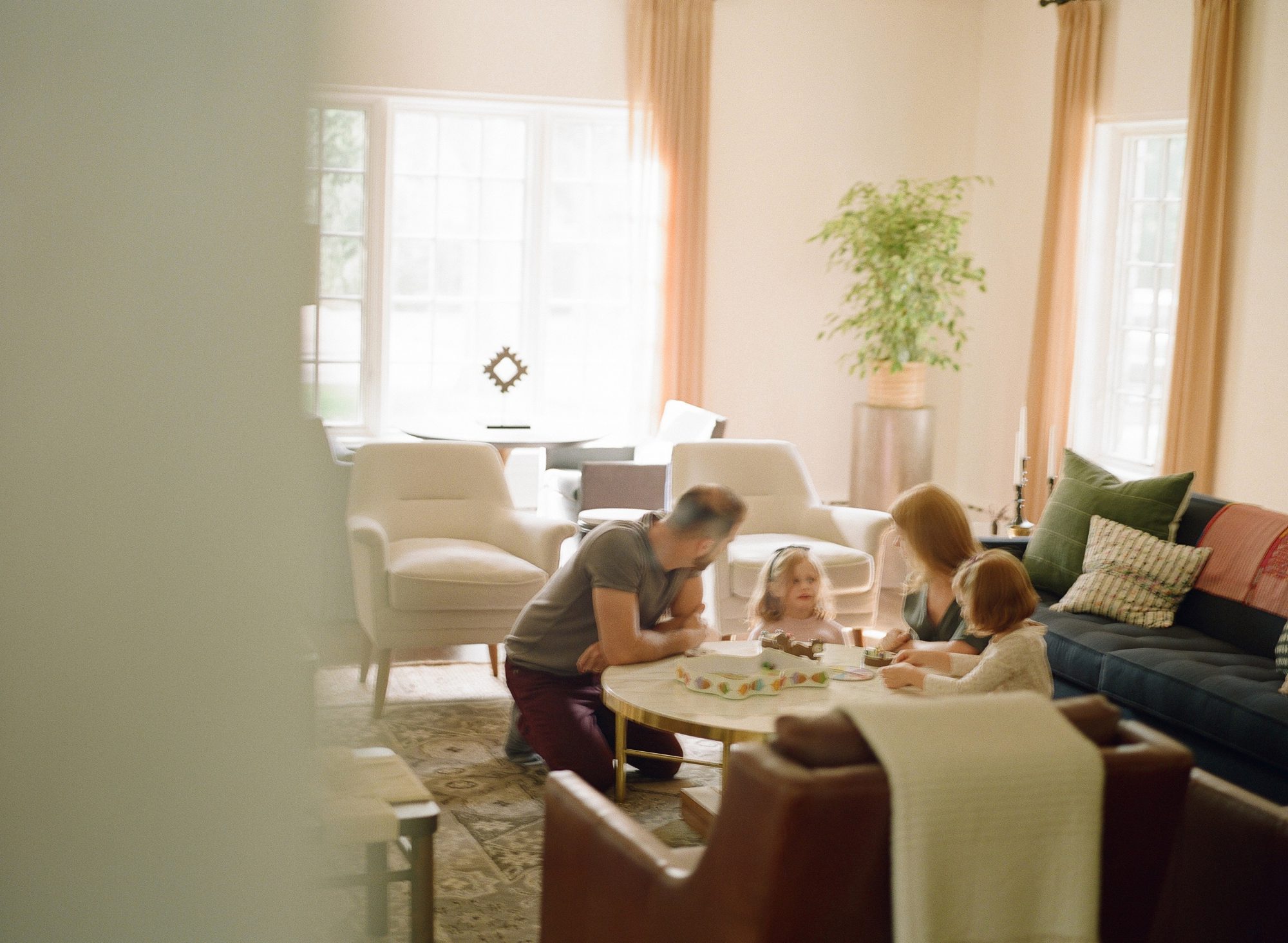 A family played games together during their chicago home lifestyle photoshoot