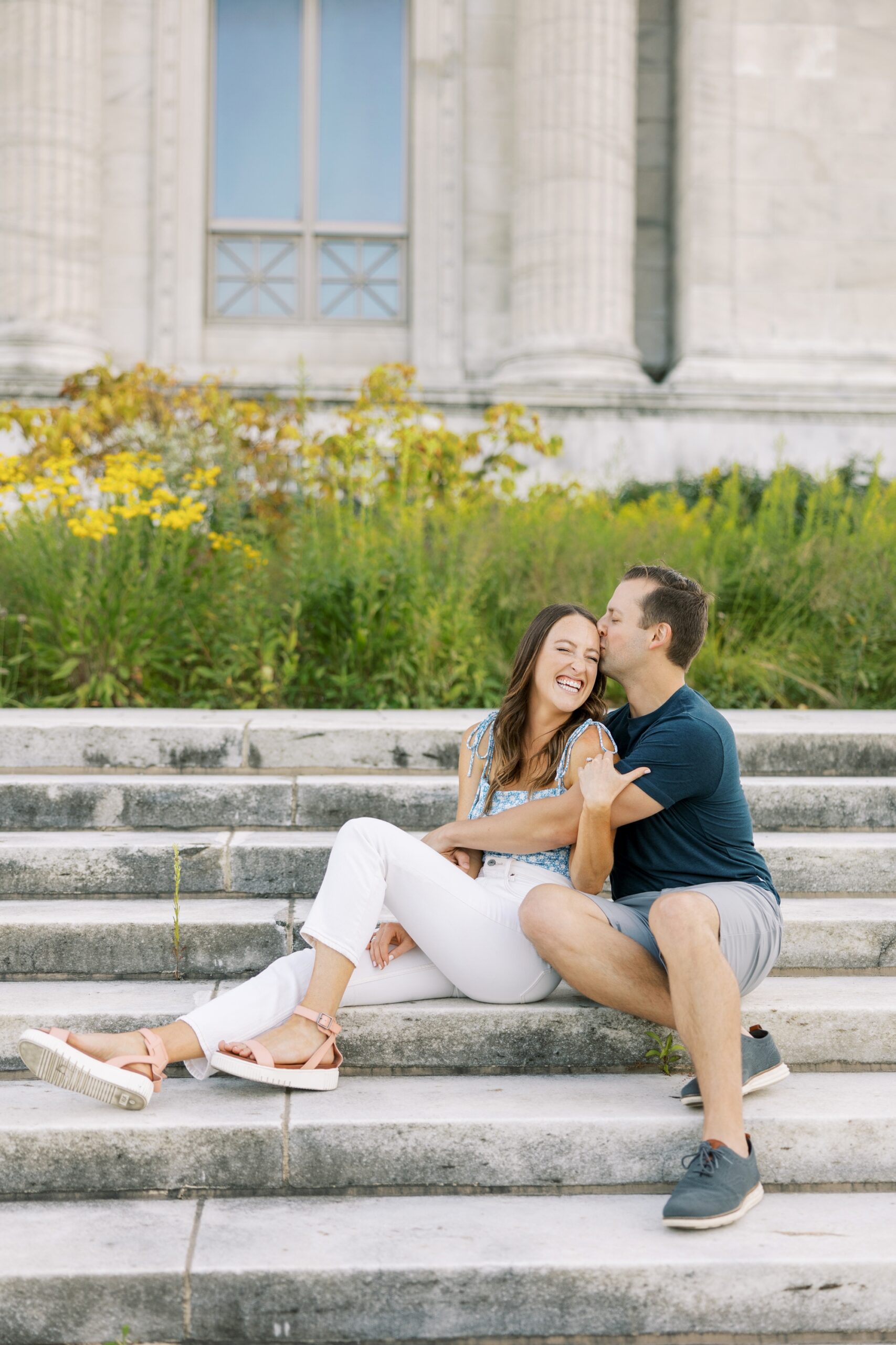 The couple sat during their Chicago Museum Campus engagement photo session