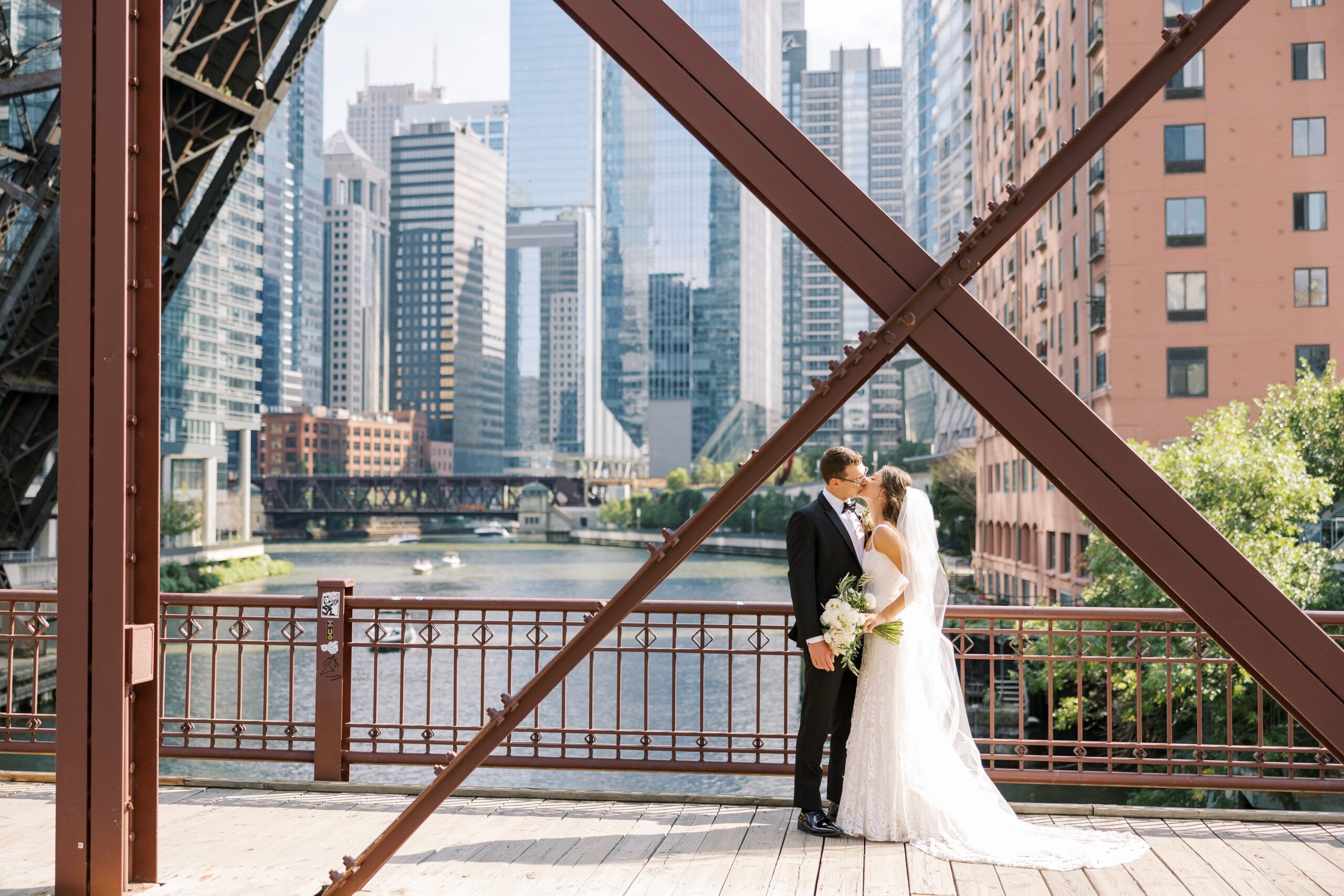 bride and groom in downtown chicago before galleria Marchetti wedding
