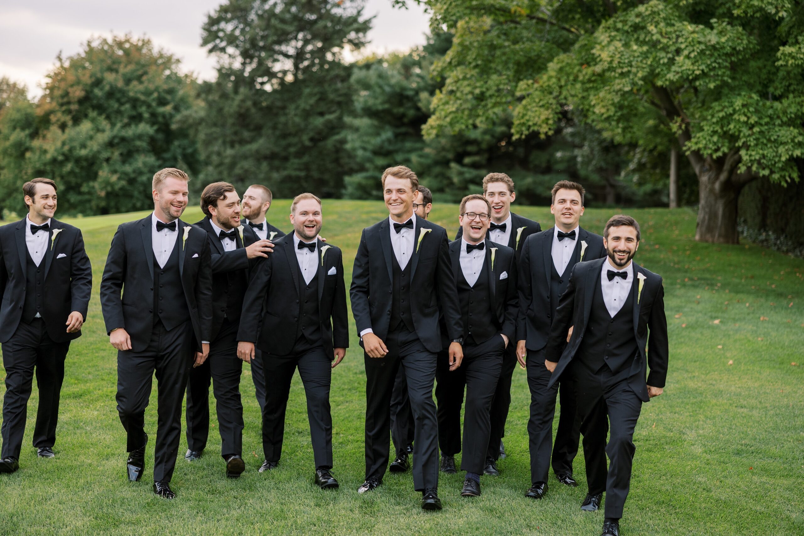 The groom and groomsmen posed at the Westmoreland Country Club wedding