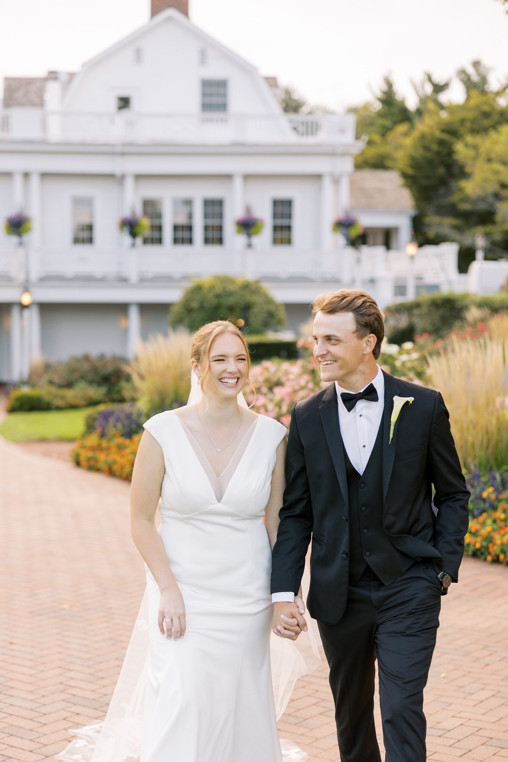 The bride and groom walked to their Westmoreland Country Club wedding reception