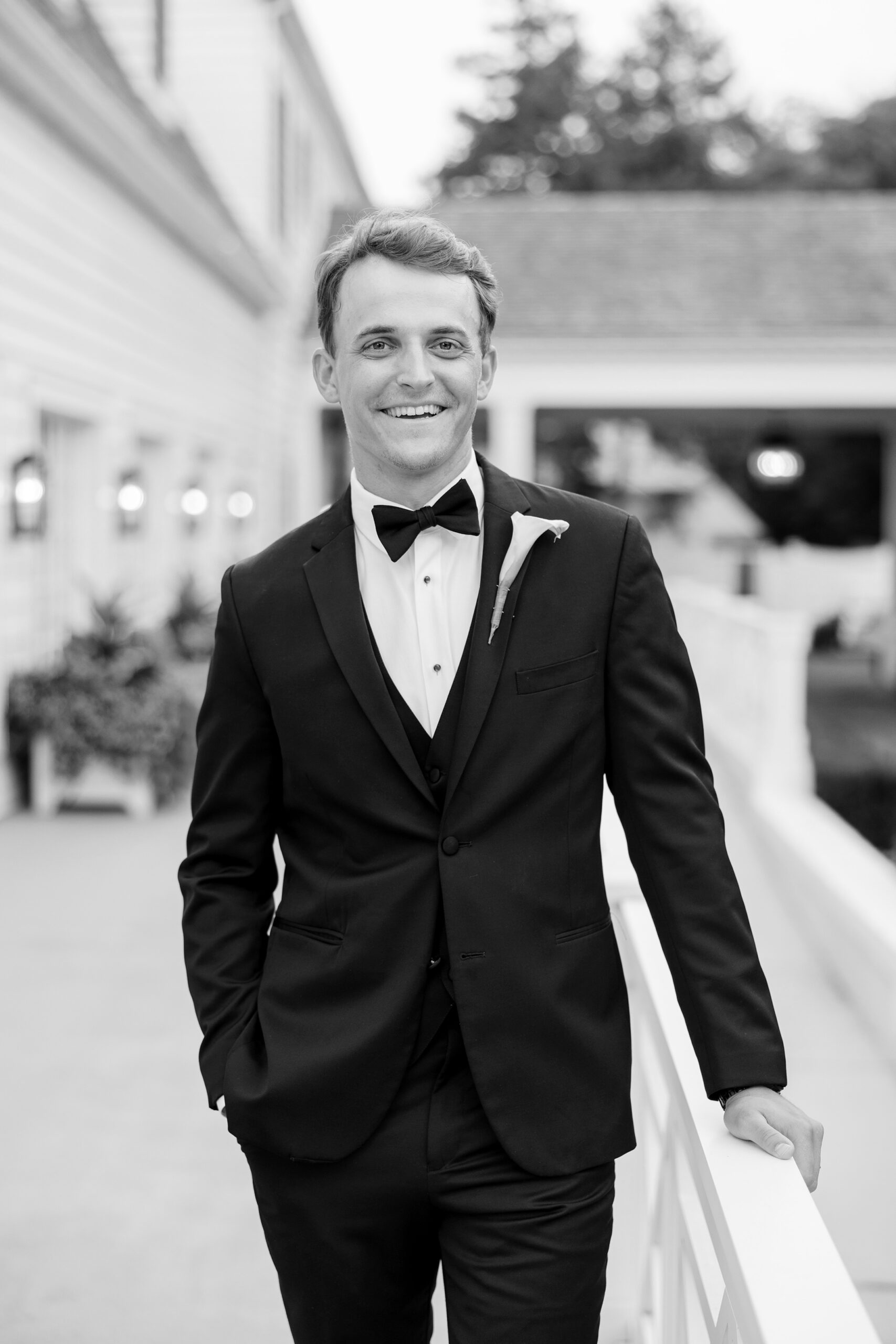 The groom smiled at the camera before the Westmoreland Country Club wedding reception