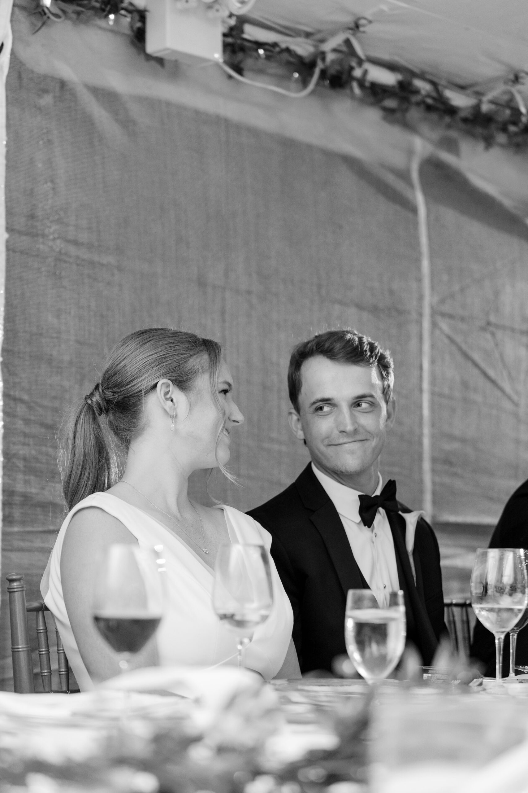 The couple smiled at each other during the Westmoreland Country Club wedding reception