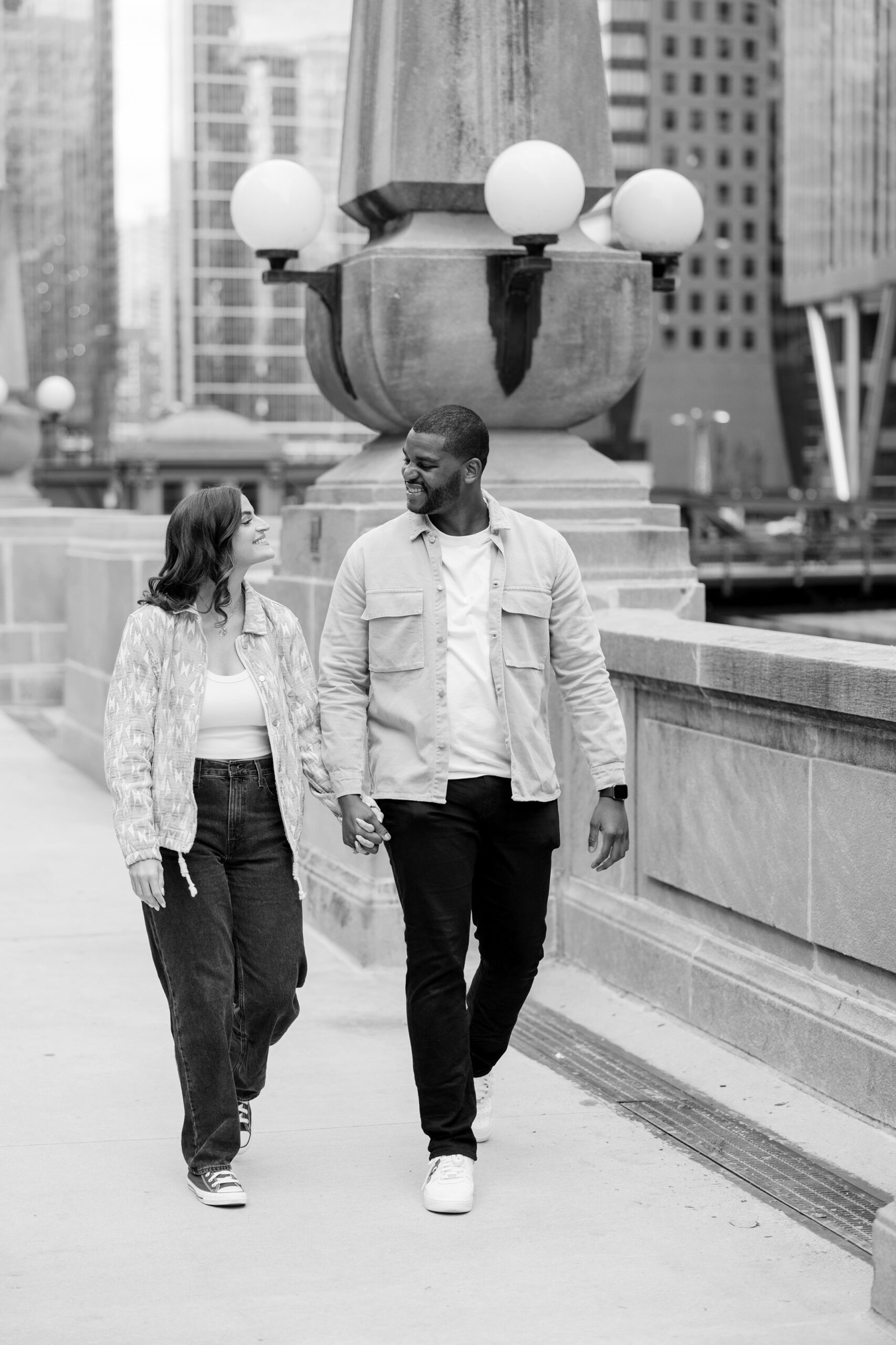 Couple holding hands in Downtown Chicago