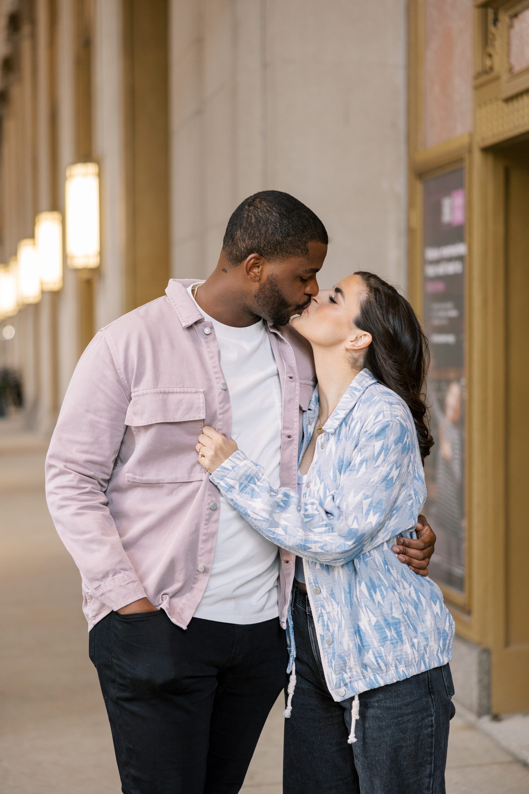 Couple kisses during Chicago engagement photoshoot