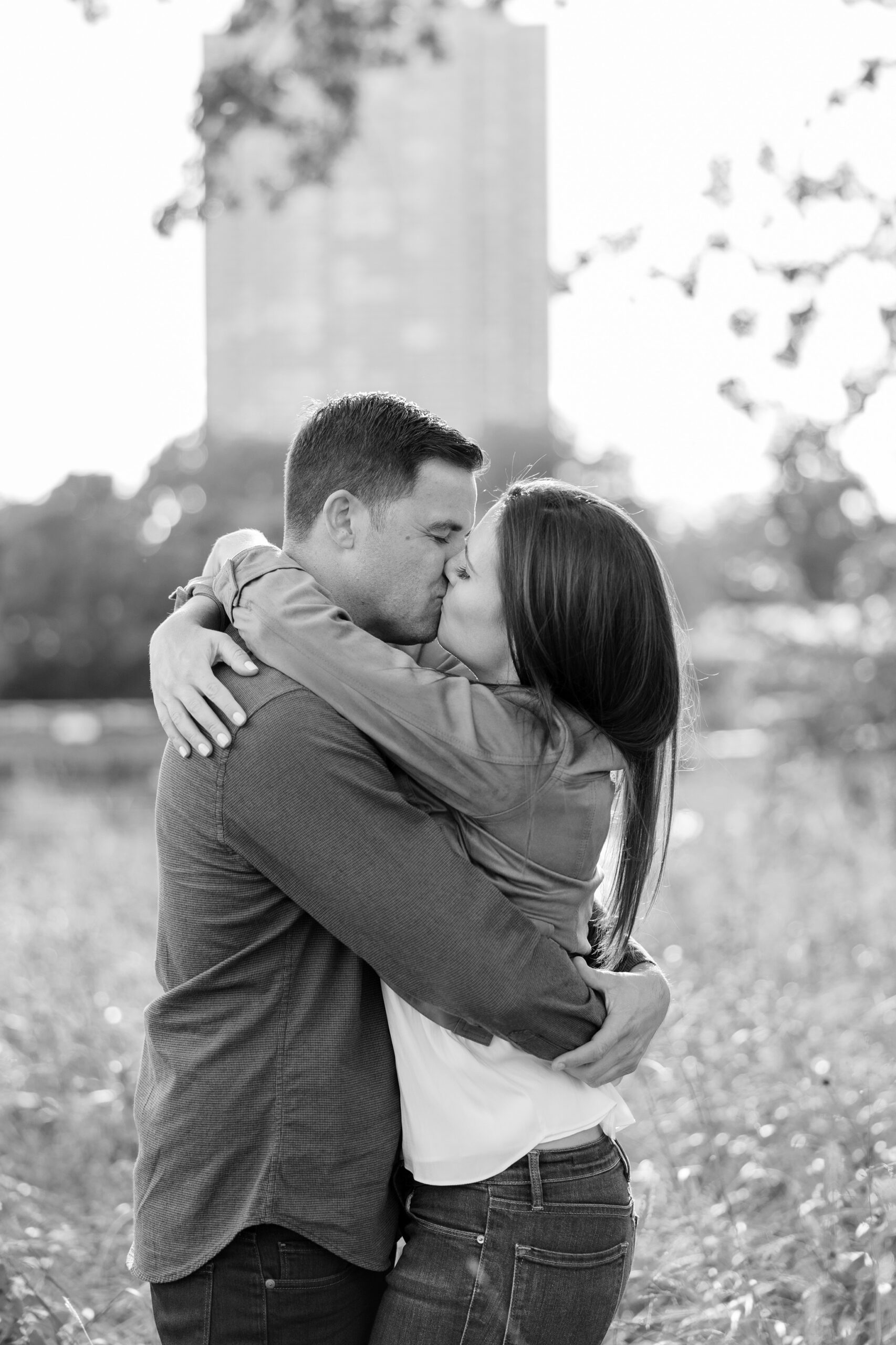 Couple kisses during fall engagement session in Chicago
