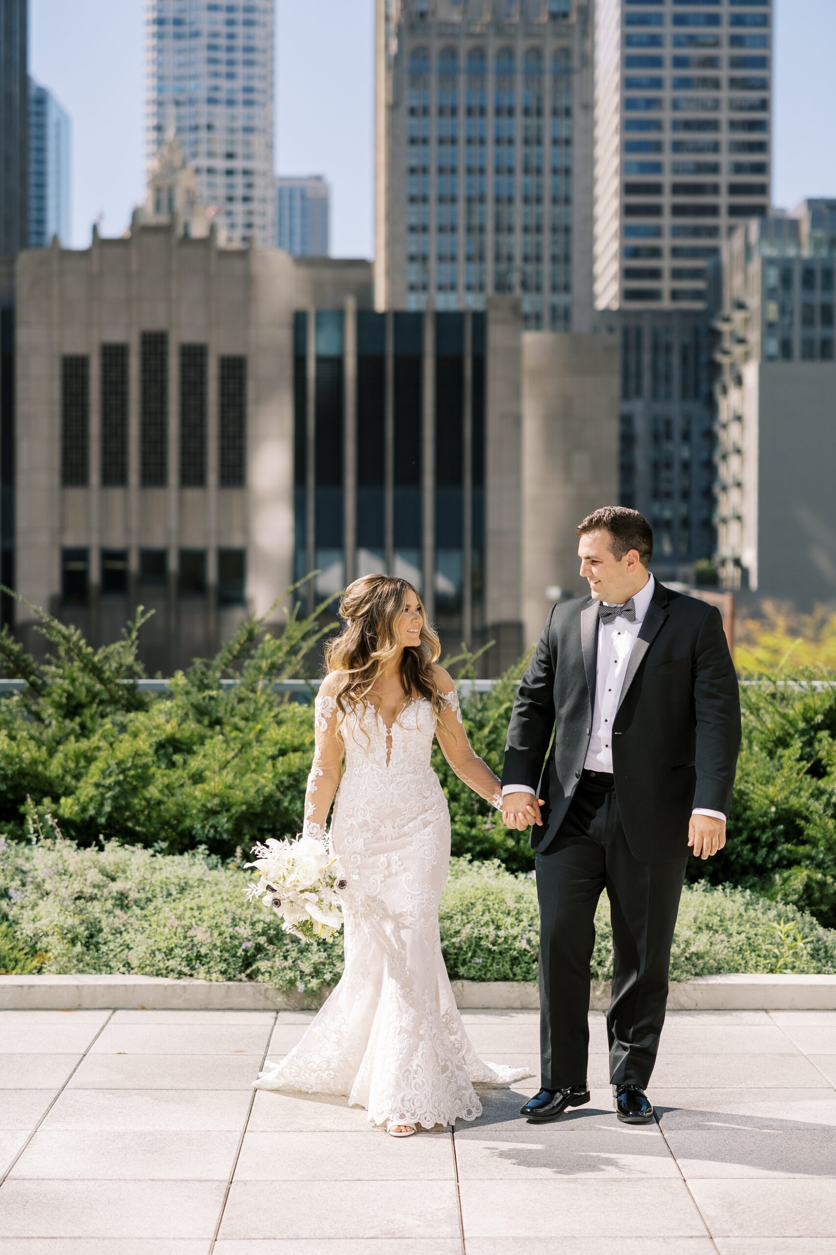 Bride and groom with Chicago skyline backdrop