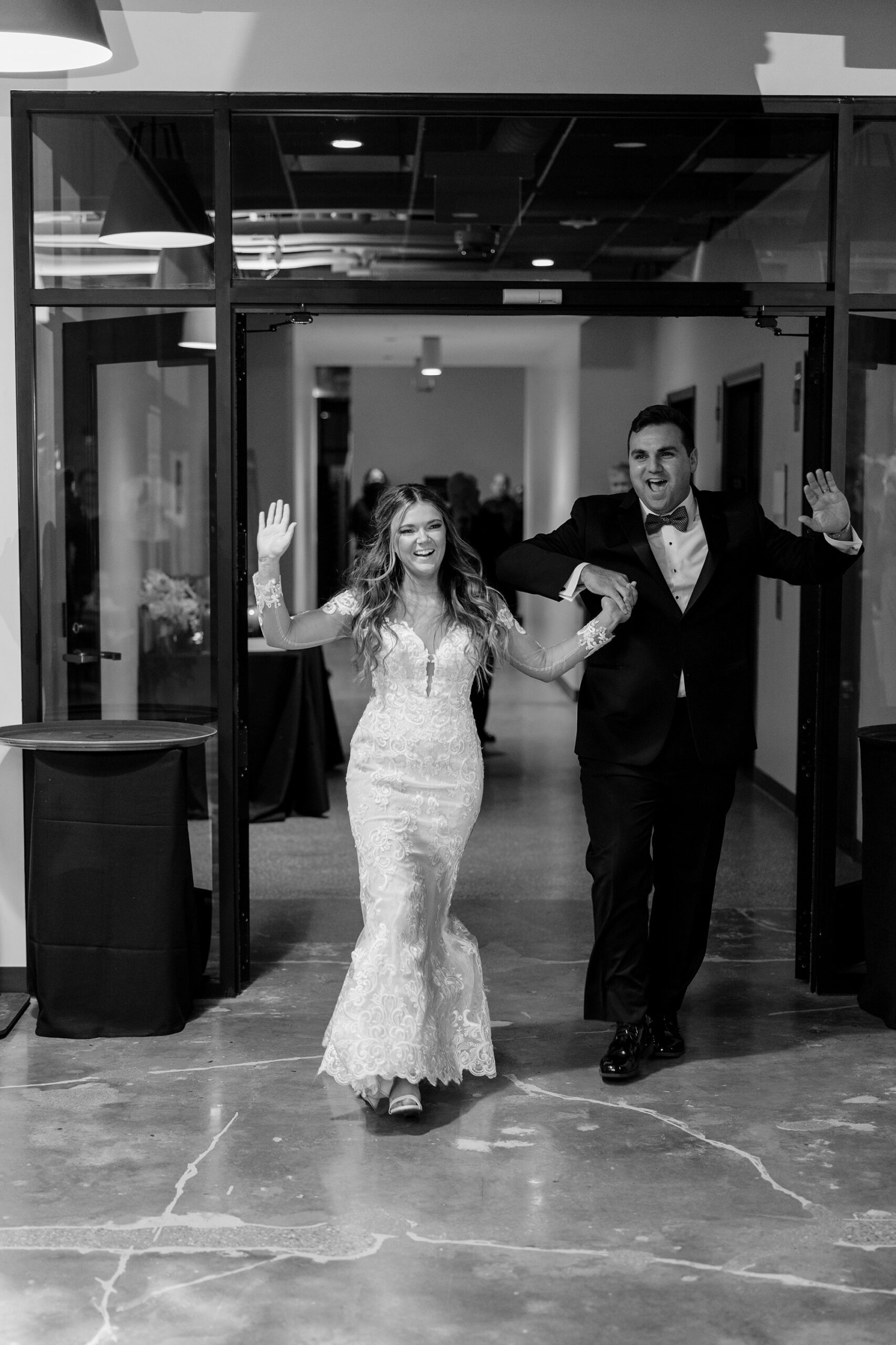 Bride and groom enter the Old Post Office Chicago wedding reception