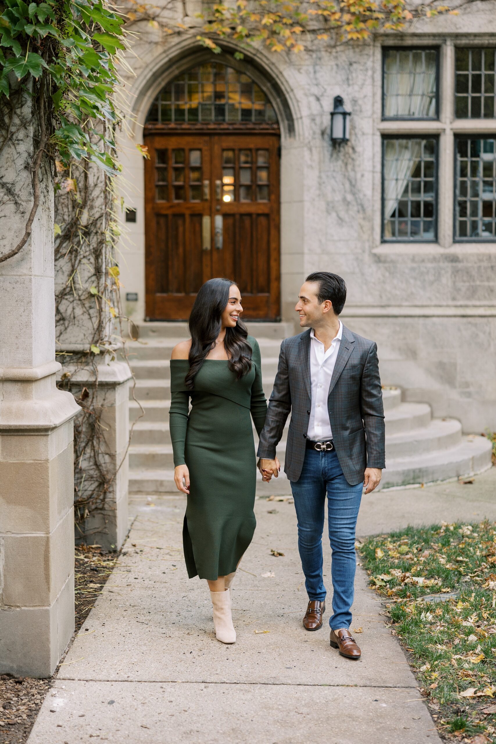 Man and woman hold hands walking at Fourth Presbyterian Church in Chicago