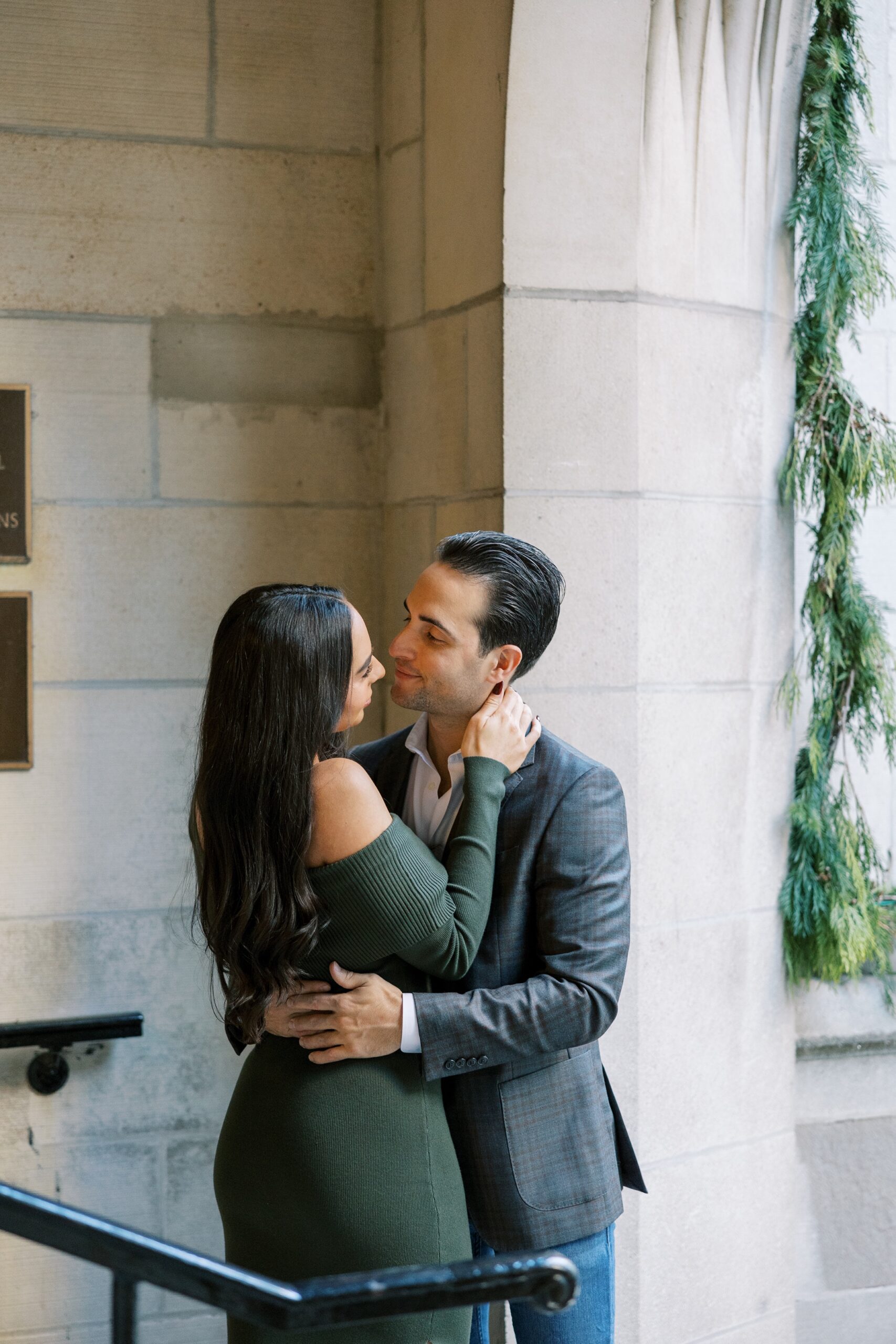 Man and woman embrace at Fourth Presbyterian Church engagement photos