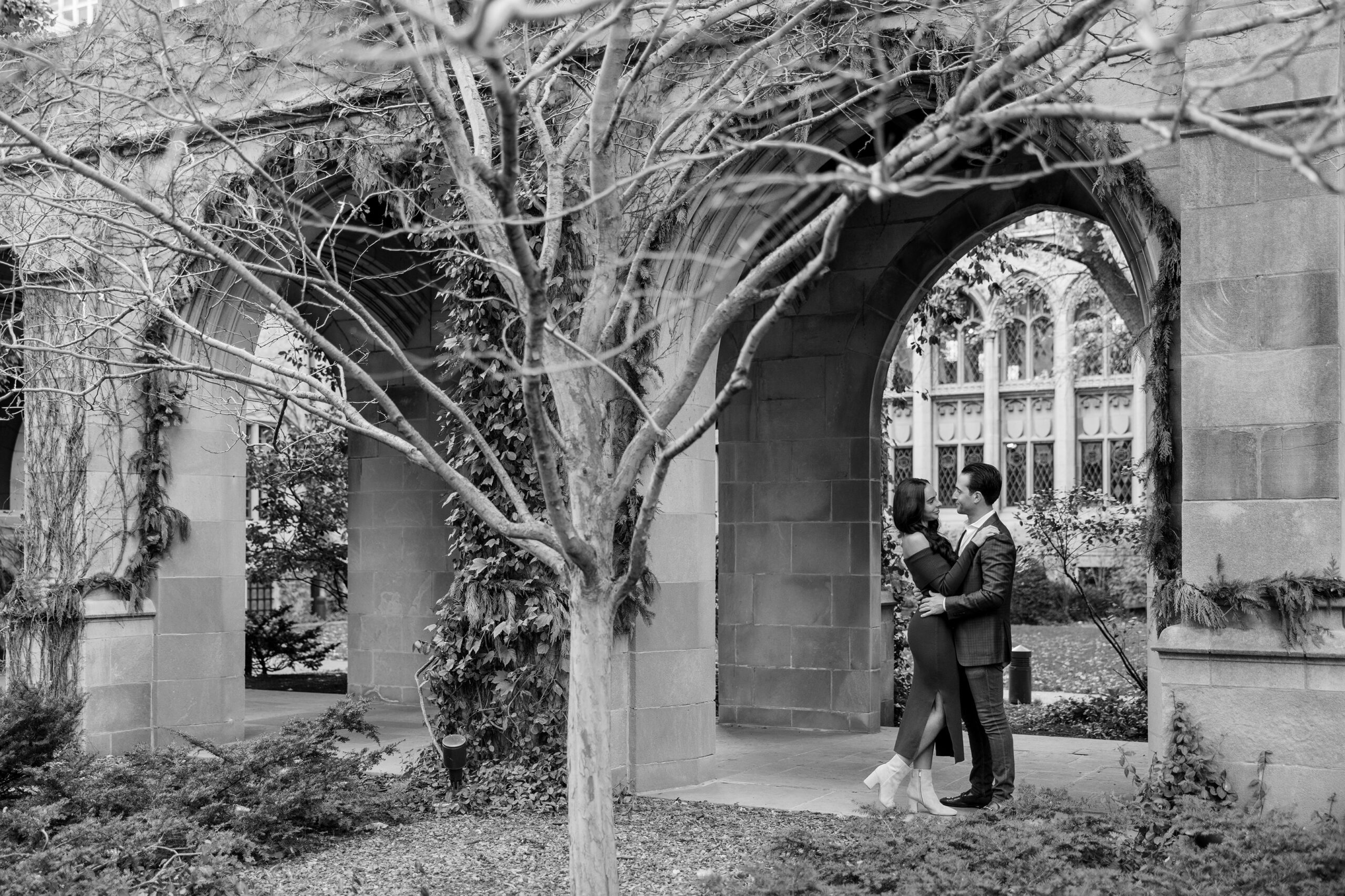 Black and white photo of man and woman at Fourth Presbyterian Church engagement shoot in Chicago