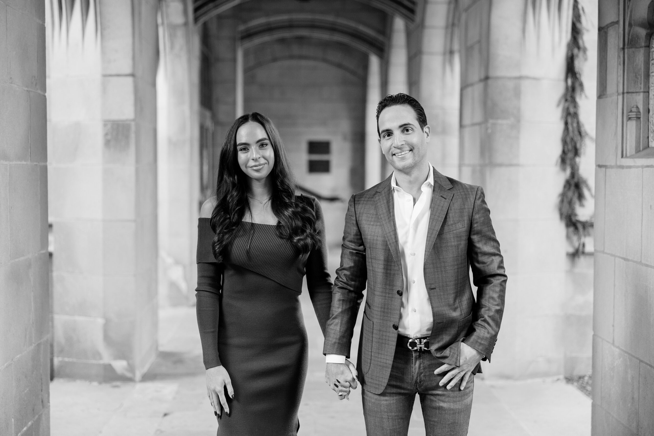 man and woman hold hands during Fourth Presbyterian Church engagement photos