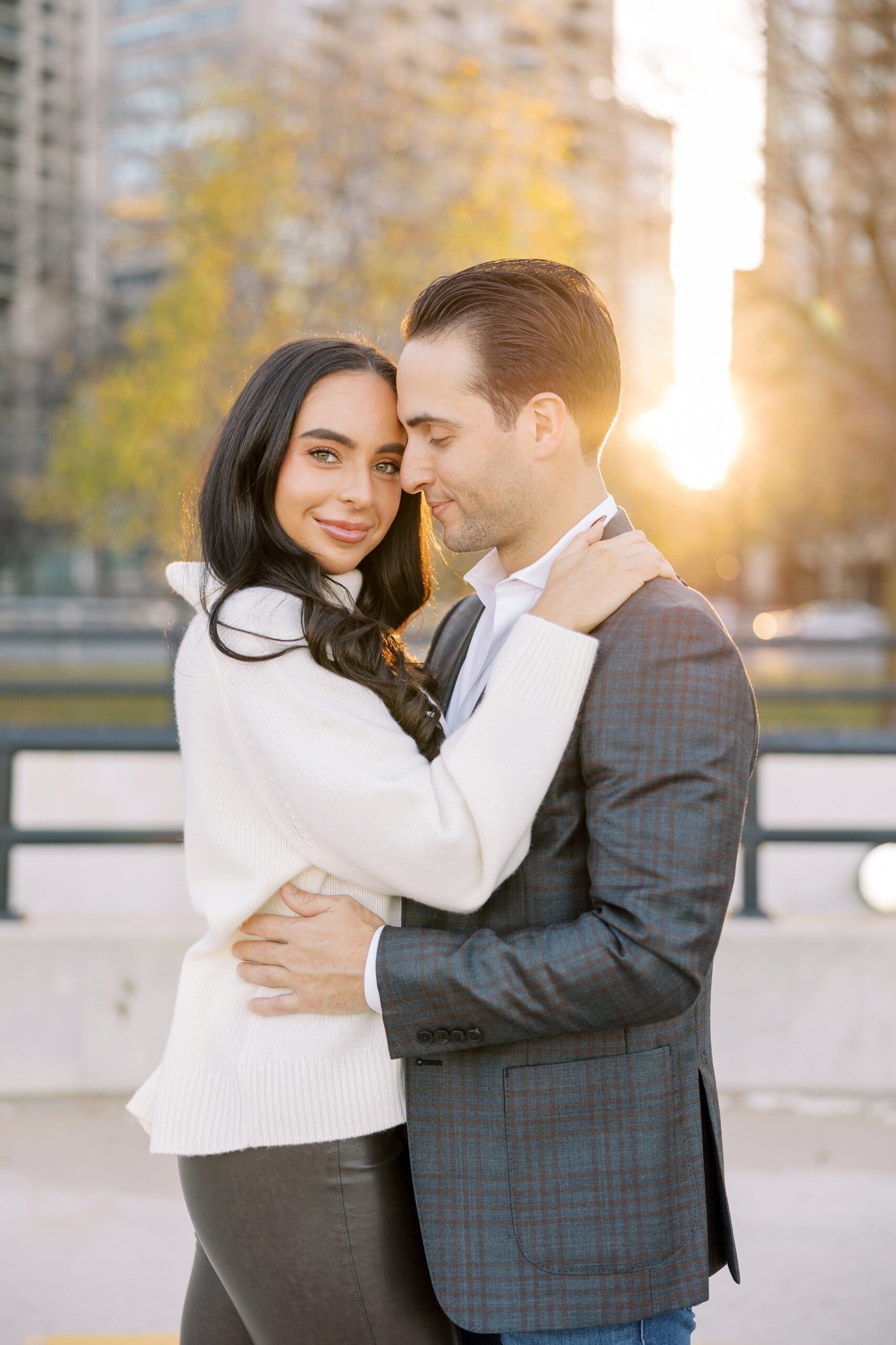 Woman smiles at camera during Chicago engagement photos