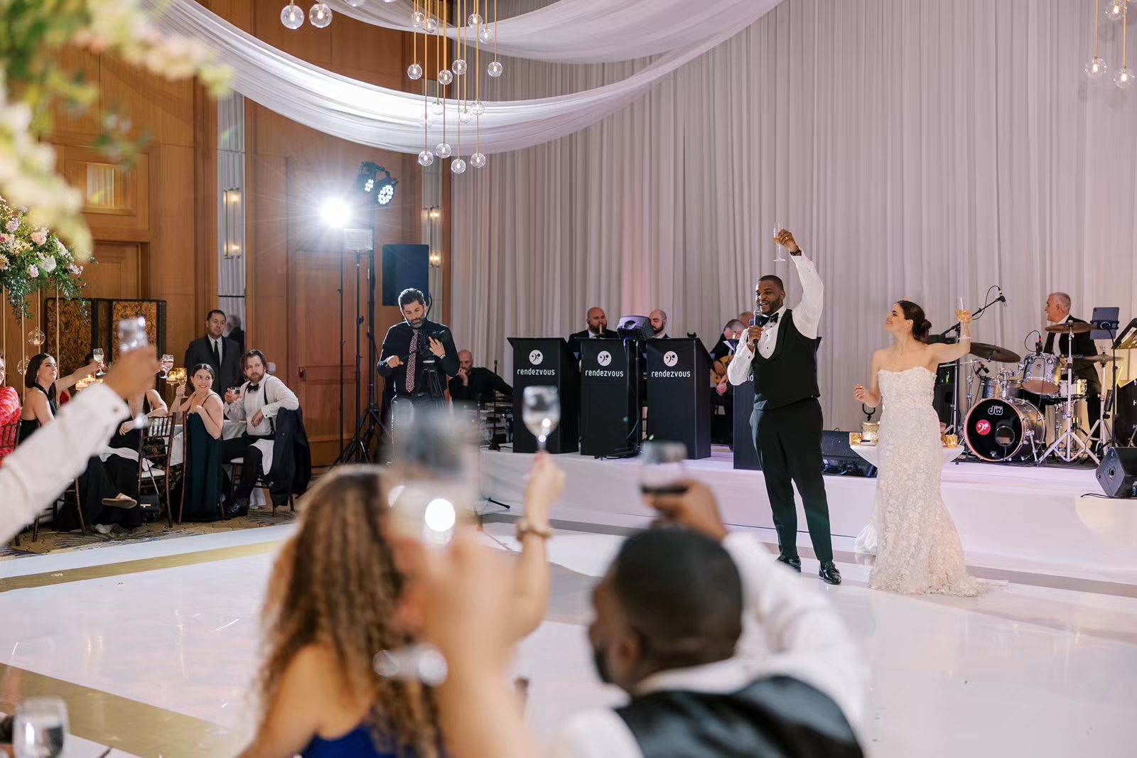 Bride and groom give a toast at the Peninsula Chicago wedding