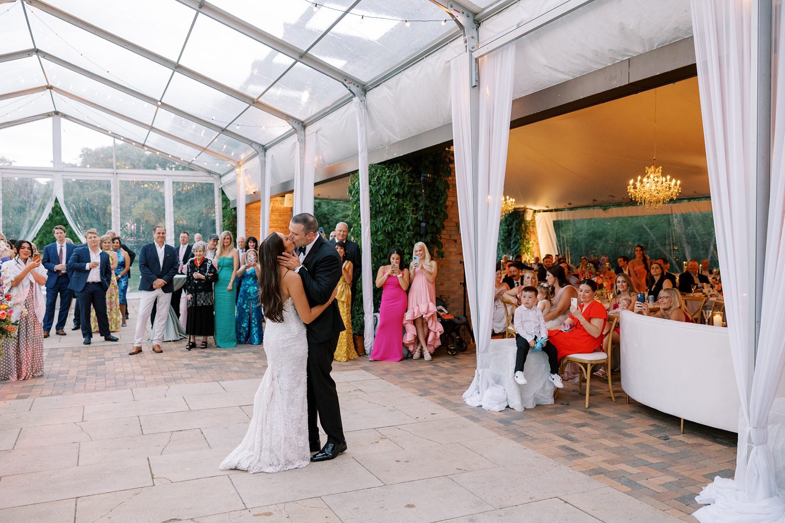 Bride and groom have first dance under tent at Chicago Botanic Garden wedding