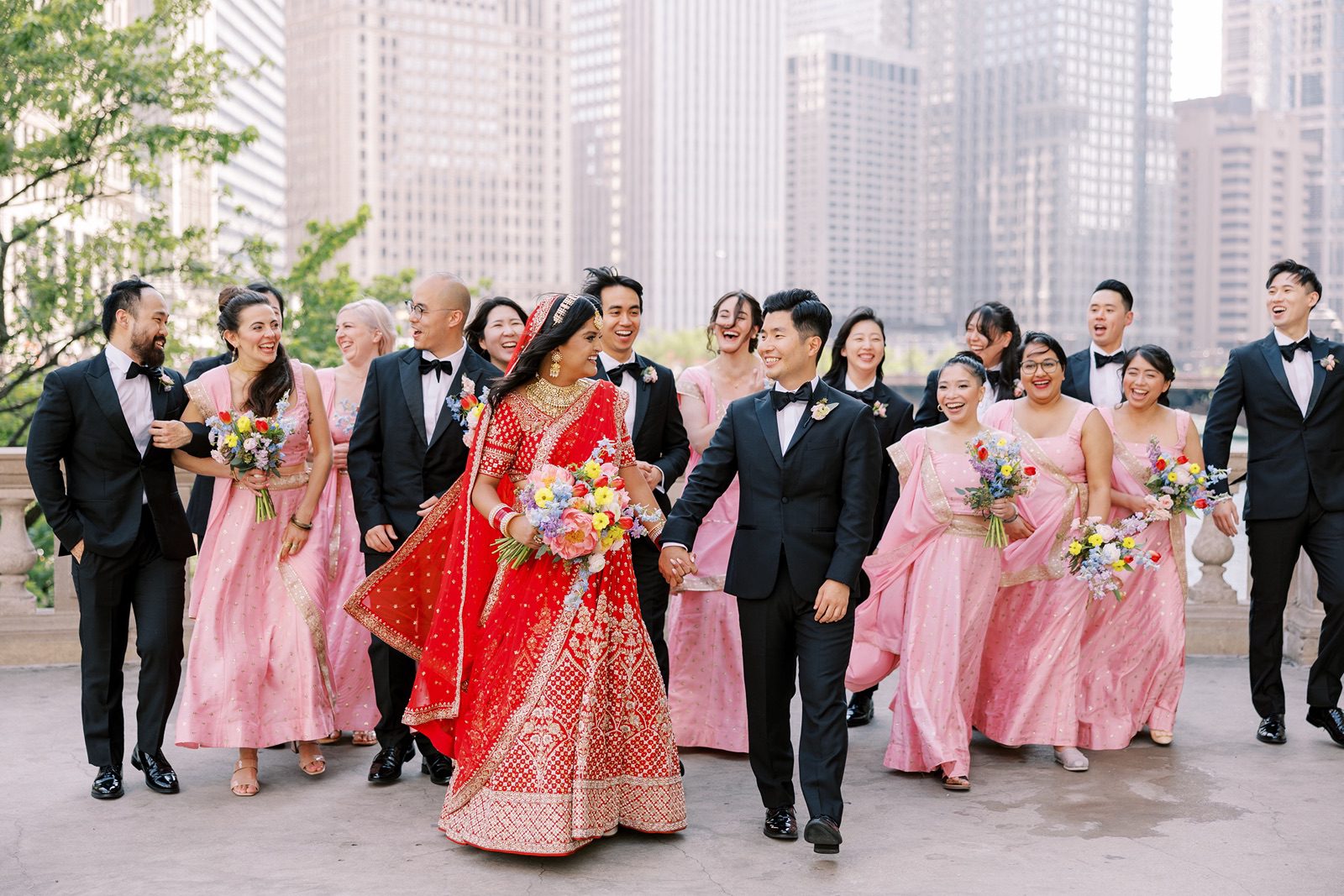 Bride and groom with their wedding party in downtown Chicago