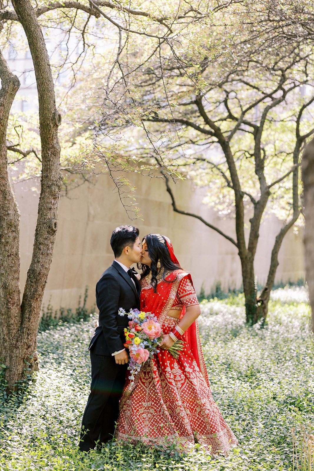 Bride and groom embrace before wedding in downtown Chicago