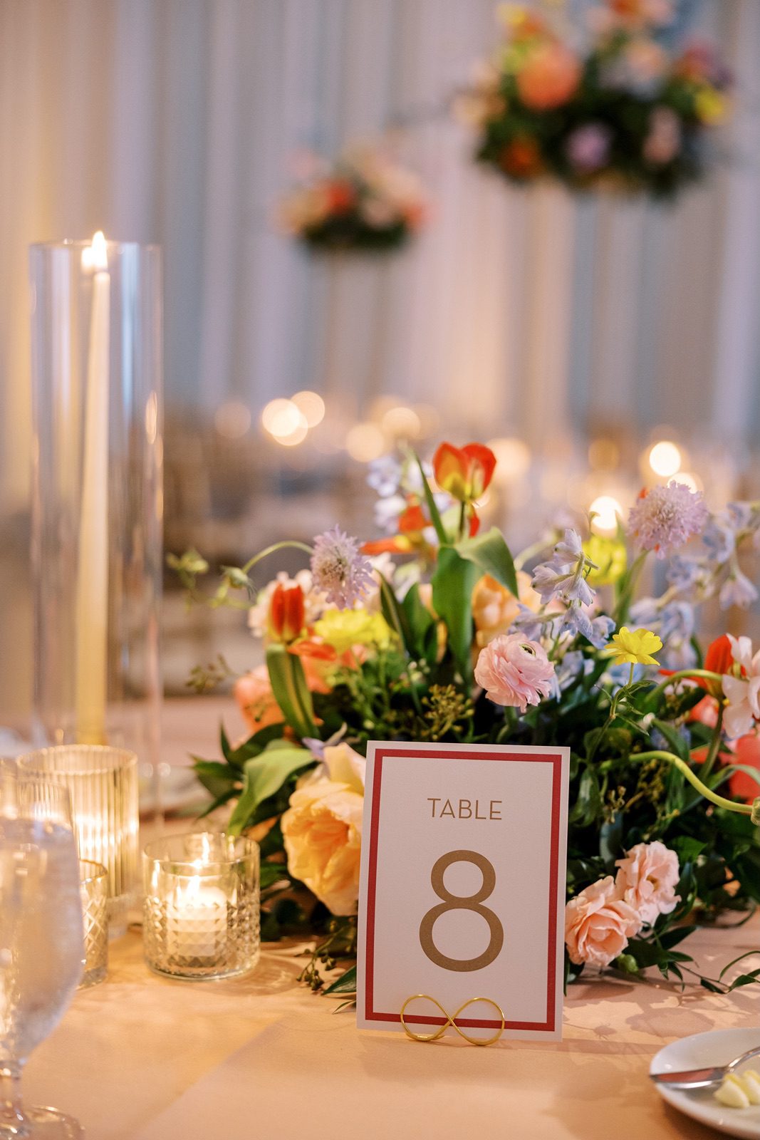 Colorful wedding table arrangements at the Venue SIX10 wedding reception