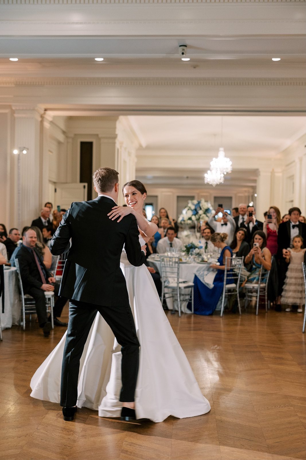 Bride and groom dance at their Chicago History Museum wedding reception